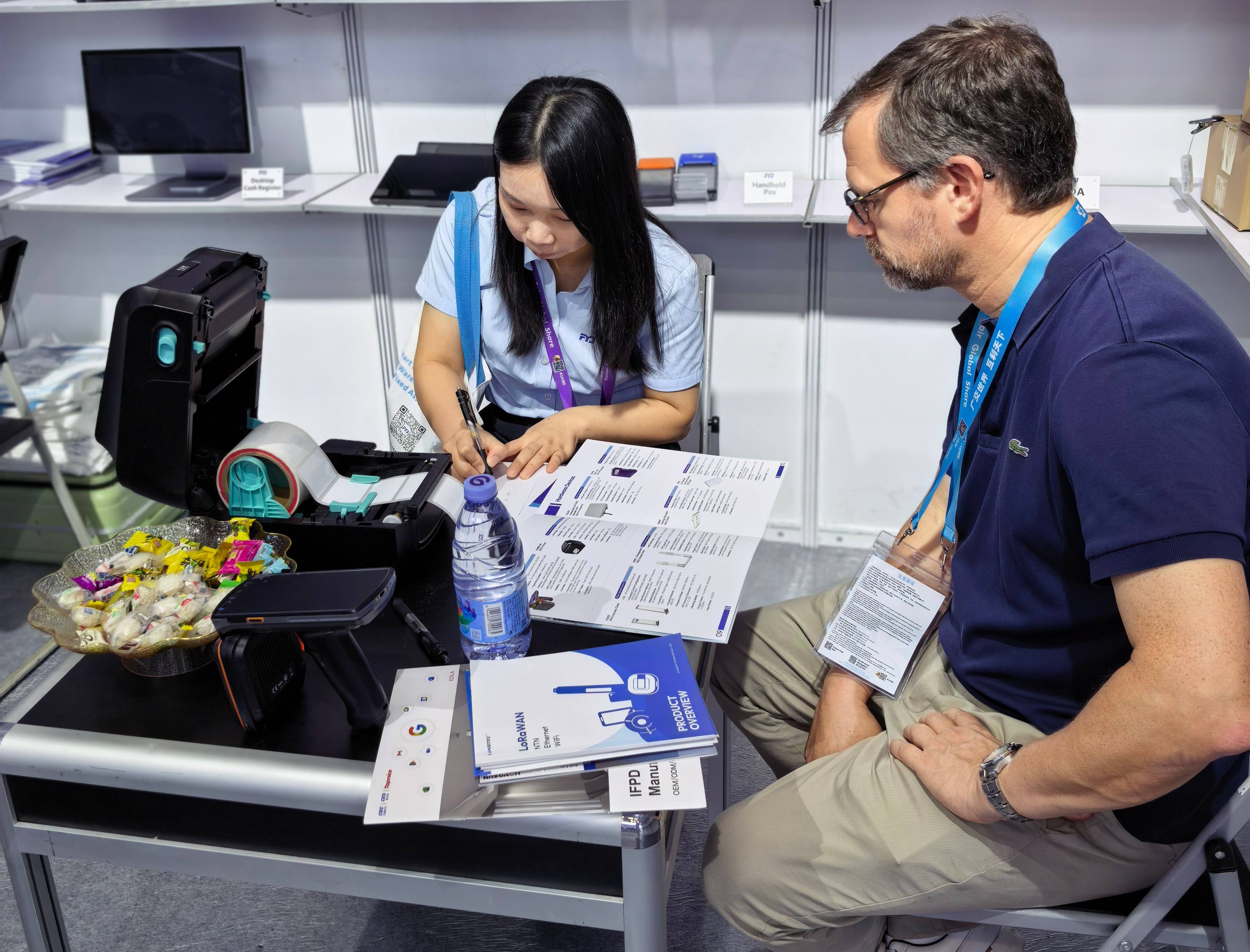 RFID printer producing labels during a live demonstration at the FYJ booth